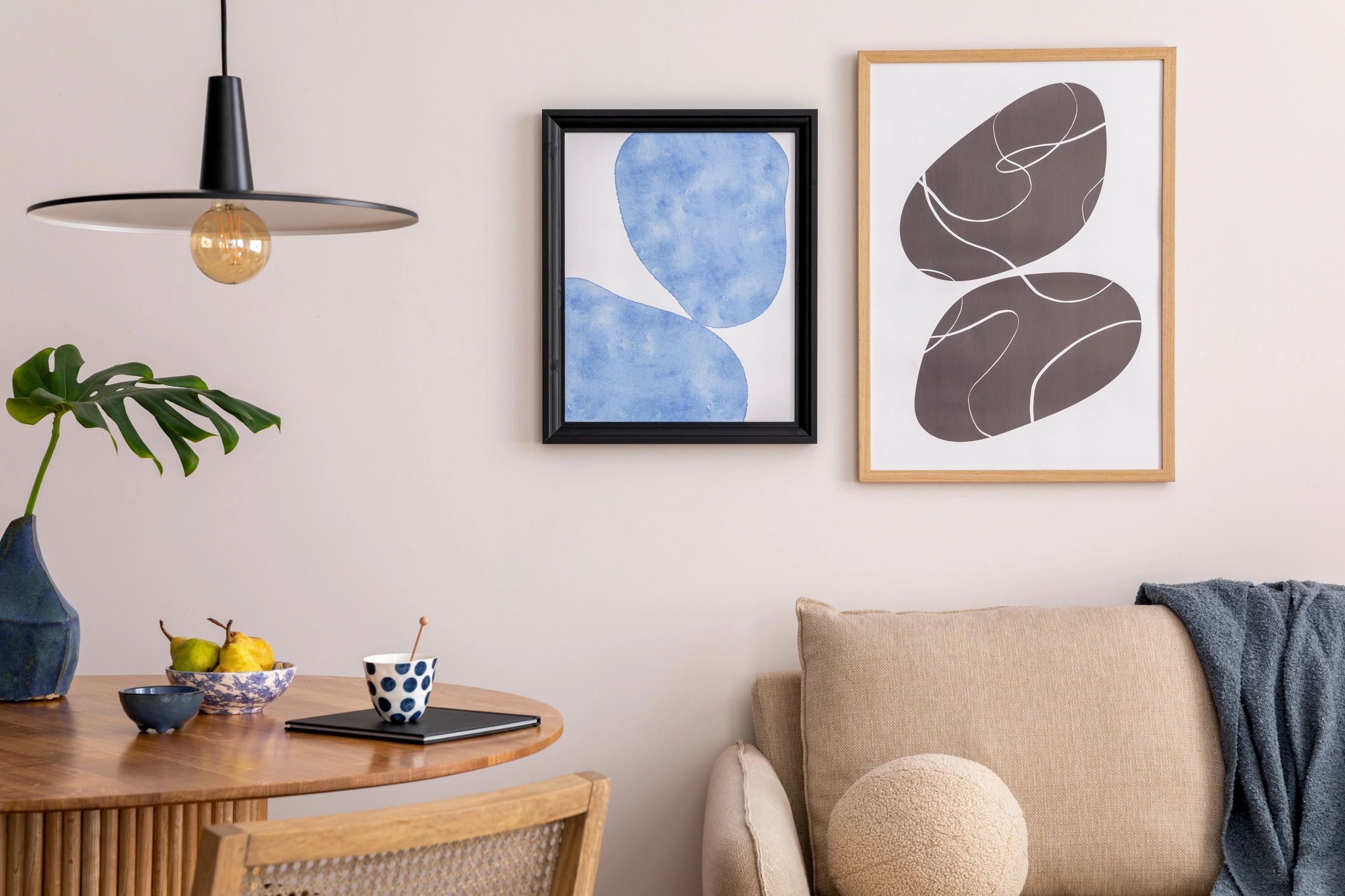 Cozy living room with a blank poster frame for showcasing wall art