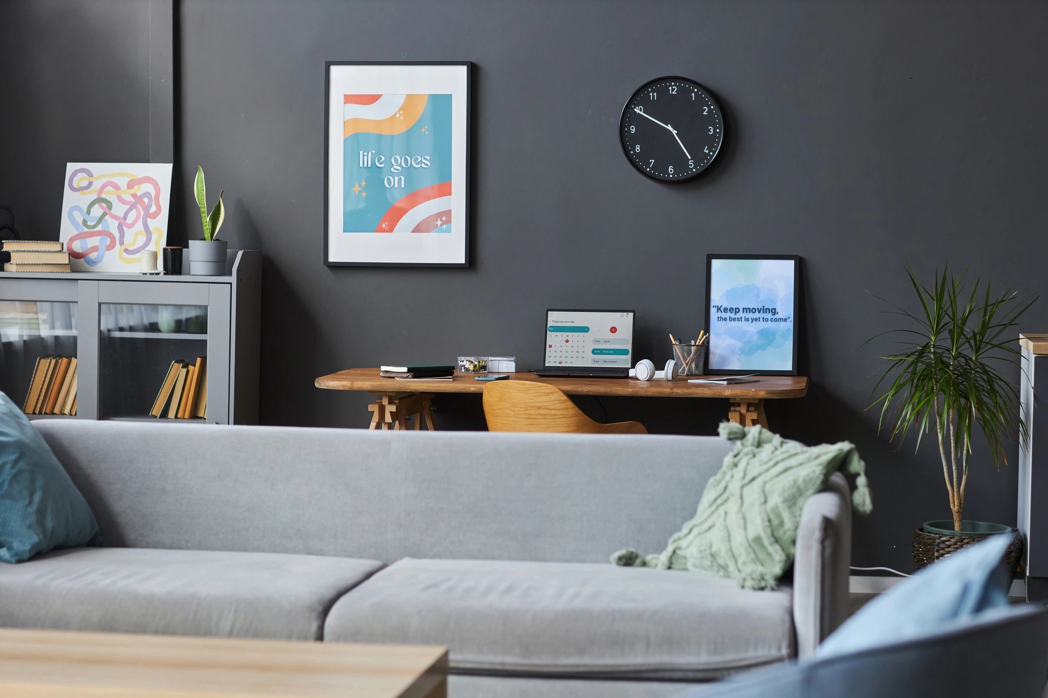 Cozy studio flat interior with wall art