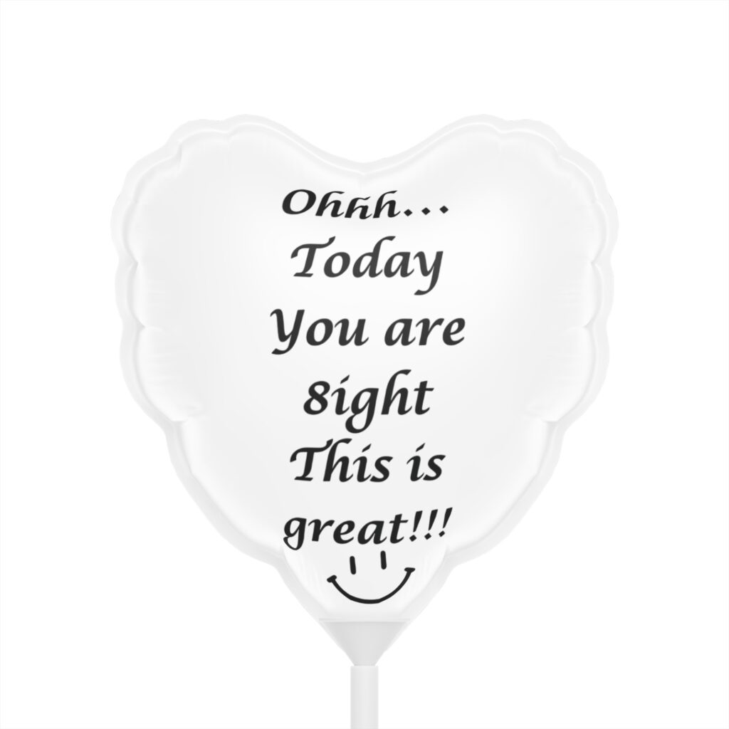 White heart-shaped balloon with text