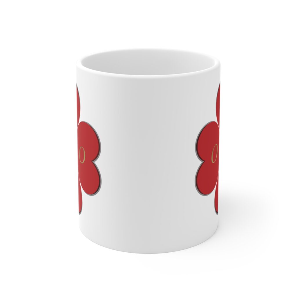 White mug with red floral design