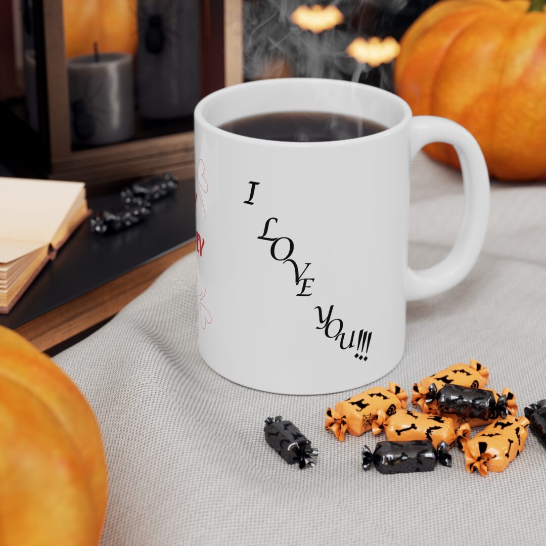 Steaming coffee mug with Halloween candy