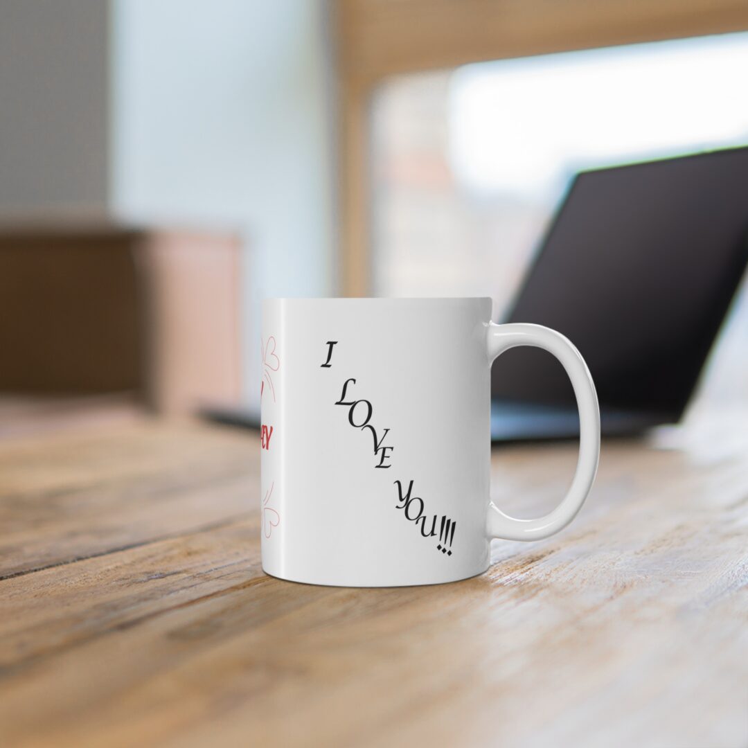White mug with love text on table