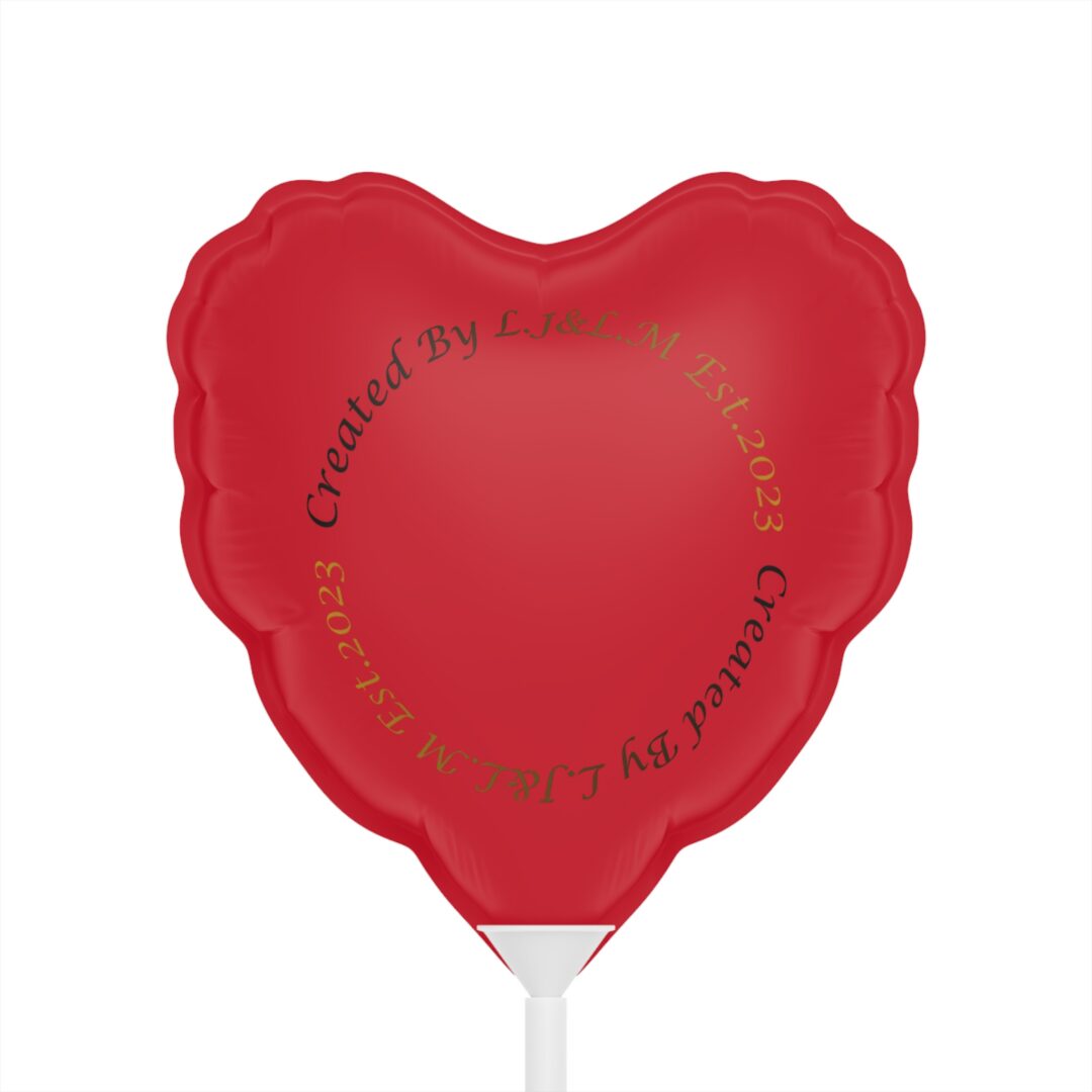 Red heart-shaped balloon on white background