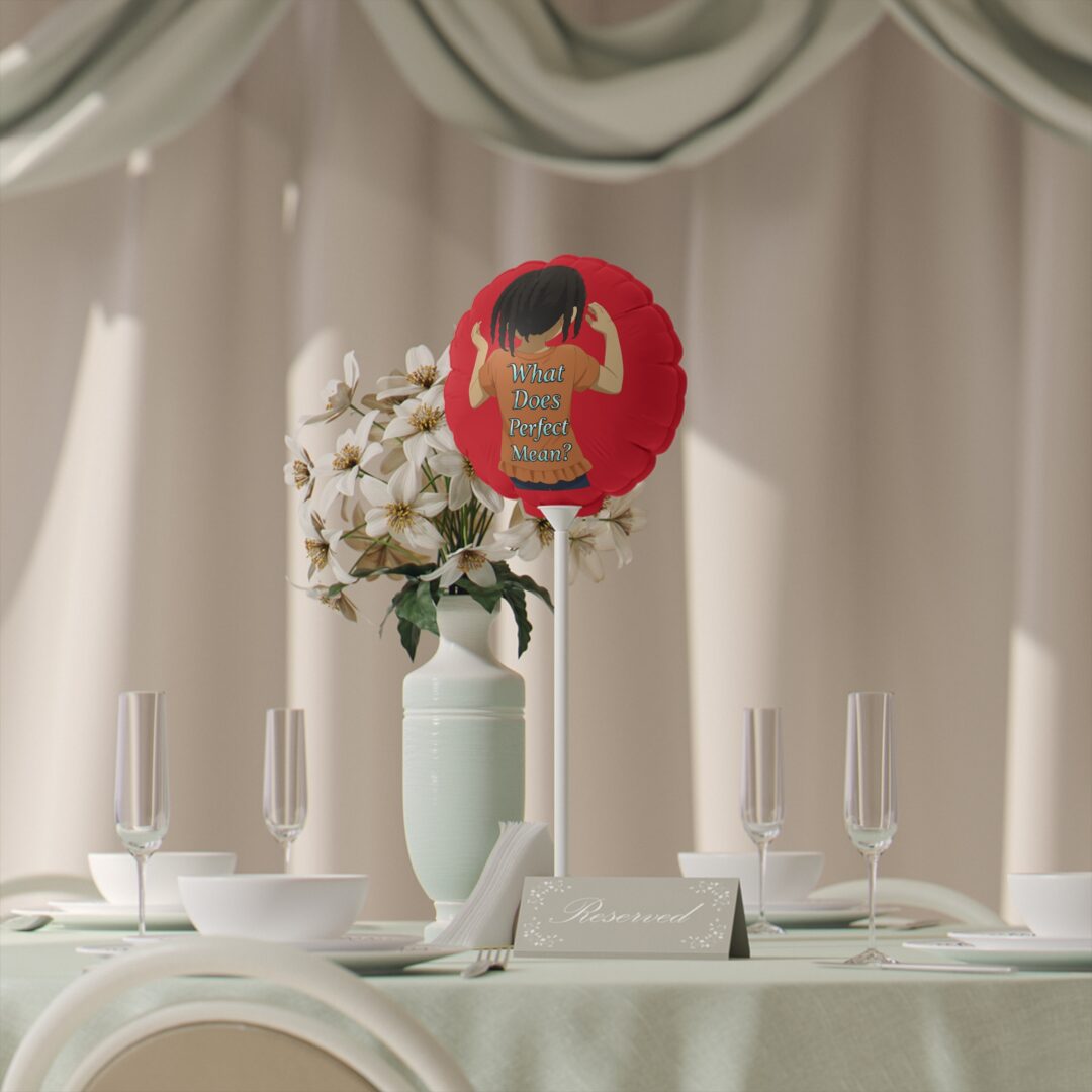 Reserved table with flowers and red balloon